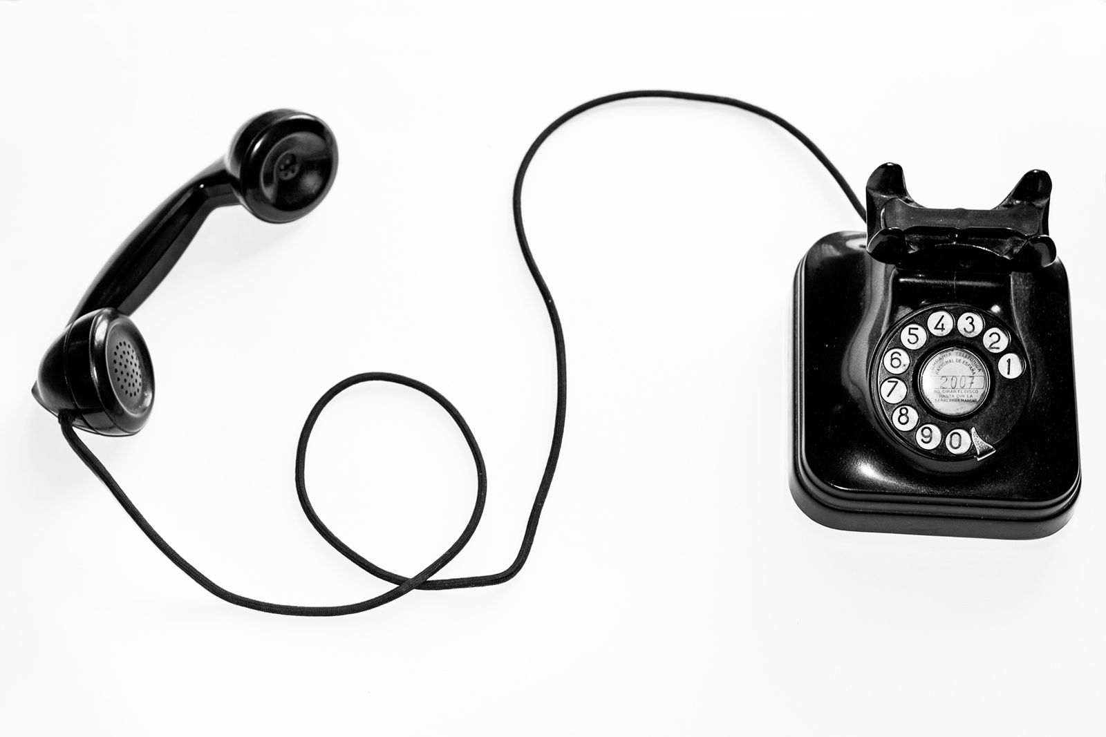 Vintage telephone on a white surface